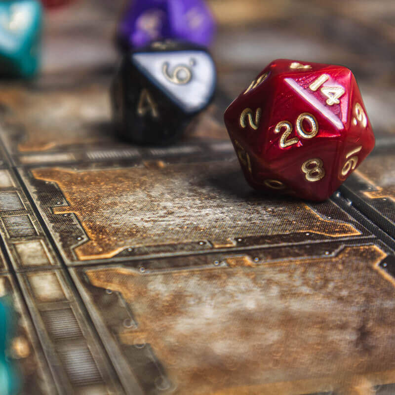 A d20 dice being rolled.